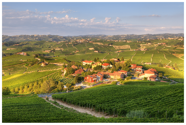 View on small village among vineyards and hills of Piedmont, northern Italy 