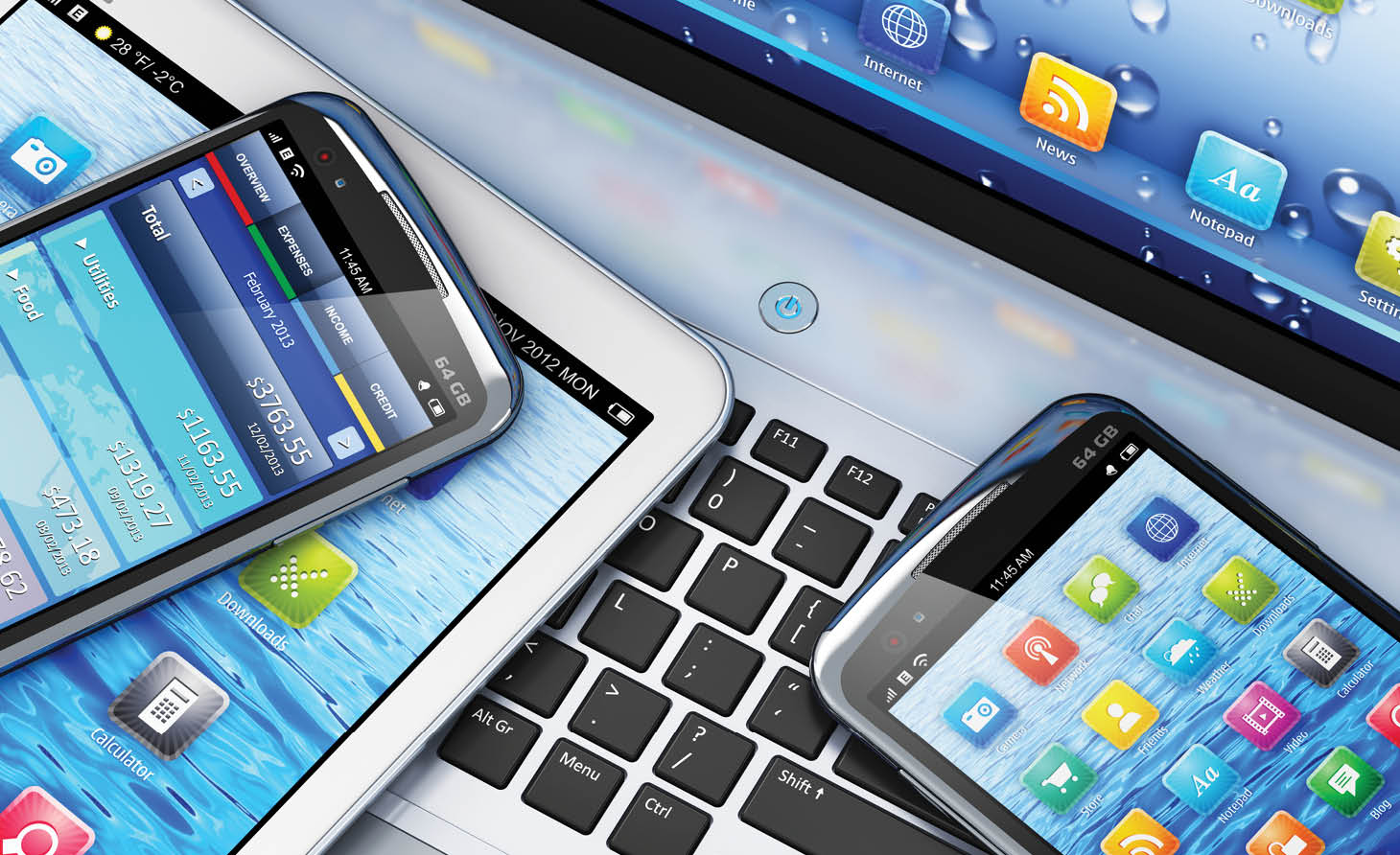 Mobility and modern telecommunication concept: macro view of tablet computer and touchscreen smartphones with colorful interfaces on laptop notebook PC